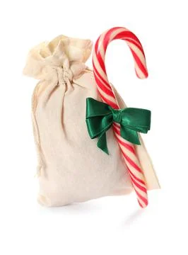 Small bag with candy cane and green ribbon isolated on white. Christmas adven 스톡 사진