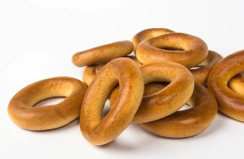 Small bagels on a white background Stock Photos