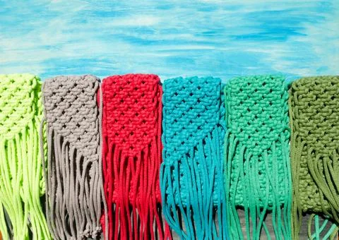 Small bags knitted with macrame technique. Stock Photos