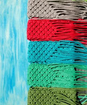 Small bags knitted with macrame technique. Stock Photos