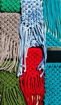 Small bags knitted with macrame technique. Stock Photos