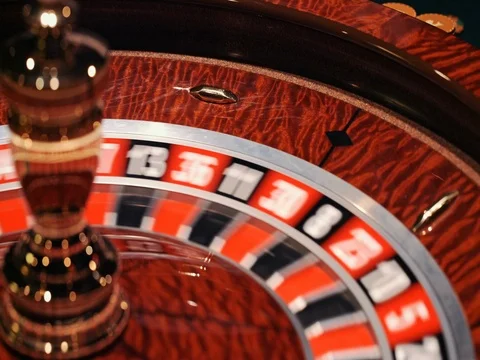 The small ball falls into the slot as the Roulette Wheel spins Stock Footage 73589314