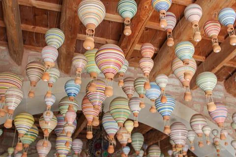 Small Balloons Hanging on Threads in a Ceramic Shop Stock Photos