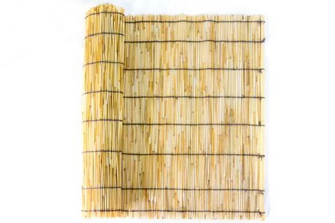 Small bamboo lined with a rope. Used for curtain Stock Photos