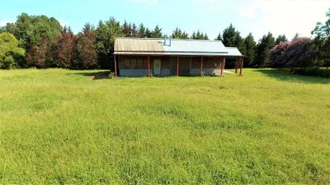 Small barn in a meadow Stock Photos