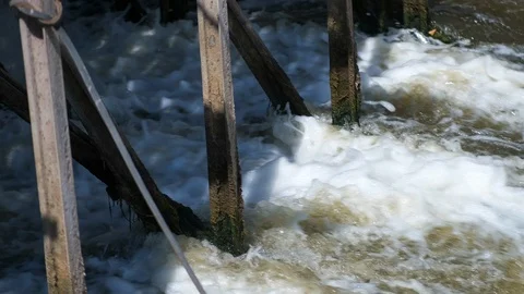 Small basic concrete lake dam to river. old dam in countryside 스톡 동영상 114358589