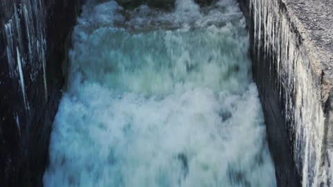 Small basic concrete lake dam to river. old dam in countryside. Video stock 118521057