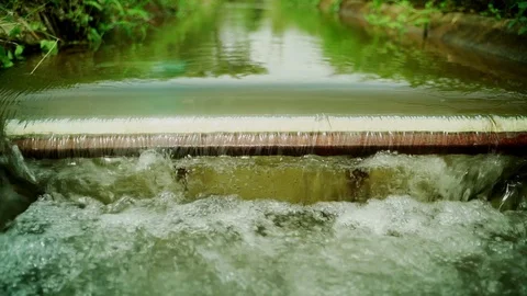 Small basic dam in order to deliver water to agricultural areas in rural Thailan Video stock 128582713