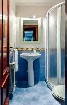 Small bathroom with shower screen Stock Photos