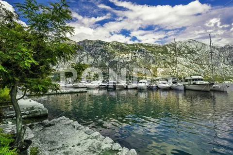 A small bay with boats Stock Photos
