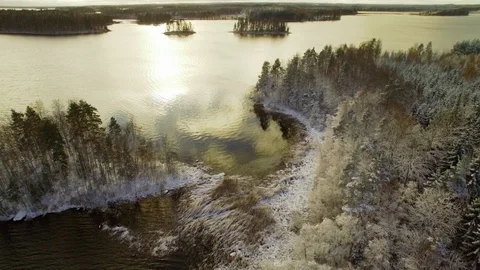Small bay at a lake with first snow on the shores. Stock Footage 86138182