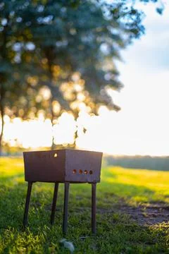 Small BBQ with beautiful sun backlight Stock Photos