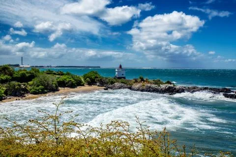 Small beach and lighthouse view at Stirling point, Bluff, New Zealand Stock Photos