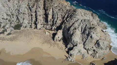 A SMALL BEACH AT THE POINT OF CAPE Stock Photos