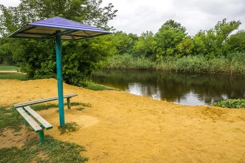 Small beach by the river 写真素材