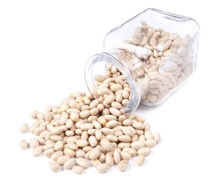 Small beans scattered on a white background Stock Photos