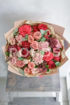 Small Beautiful bouquet of mixed flowers. Floral shop concept . Beautiful fresh Stock Photos
