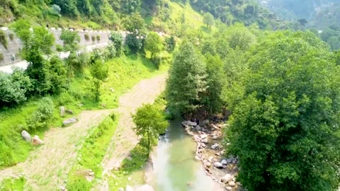 Small, beautiful mountain river in the green forest (aerial) (2) Stock-Footage 284443696