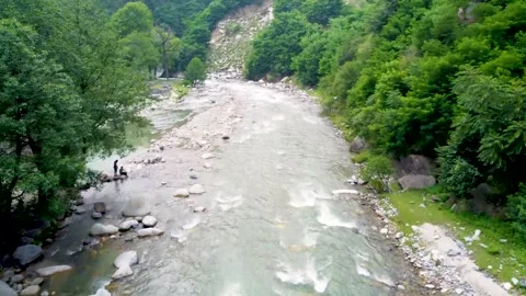 Small, beautiful mountain river in the green forest (aerial) (3) Stock Footage 284443803