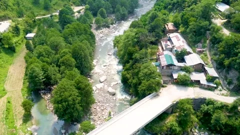 Small, beautiful mountain river in the green forest (aerial) (4) Stock-Footage 284443994