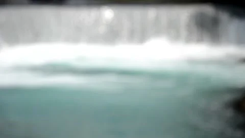 Small beautiful waterfall inside forest in the park 動画素材 133342379