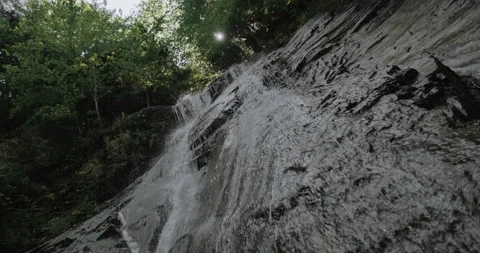 Small beautiful waterfall in mountains.  Stock Footage 159177693