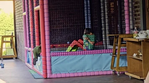 A small bed in a. Stock Footage 284645478