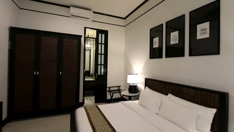 Small Bedroom Interior In Black And White Tones (1) Stock Footage 86618393