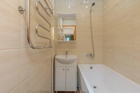 Small beige bathroom Stock Photos