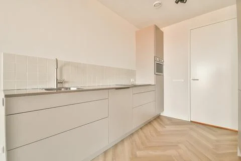 Small beige kitchen Stock Photos