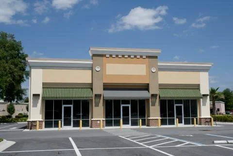 Small beige strip mall Stock Photos