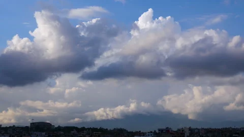 A small bird flying by in a straight angle with a beautiful sky in background Stock Footage 258535721