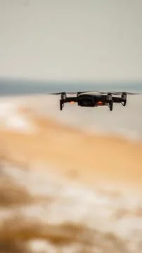 Small black drone with a camera Stock Photos