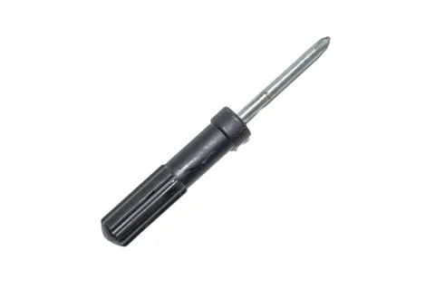 Small black handle Phillips head screwdriver isolated on a white background Photos