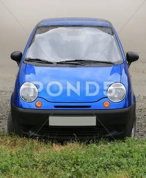 Small blue car Stock Photos