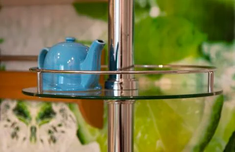 Small blue ceramic teapot for serving hot tea. Teapot Stock Photos