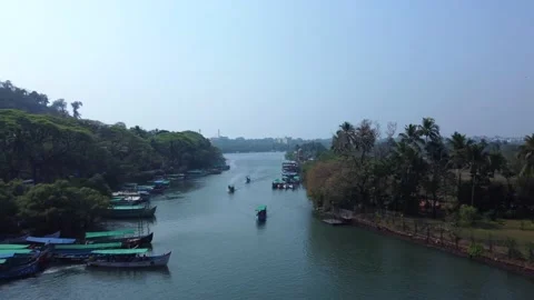 Small blue ferryboat floats on Nerul river in Aguada, Goa, india. A crowd of peo Stock Footage 209222952