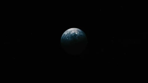 A small blue planet floats alone in deep black space with faint stars aroun.. Stock Footage 340383465