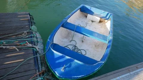 Small Blue Rowing Boat Stock Photos