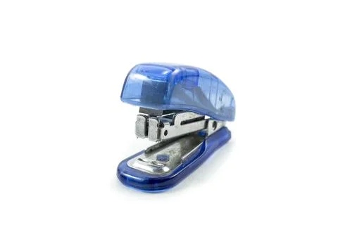 Small blue stapler isolated on a white background. Stockfoto's