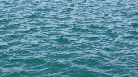 Small blue waves in the sea Stock Footage 69761703