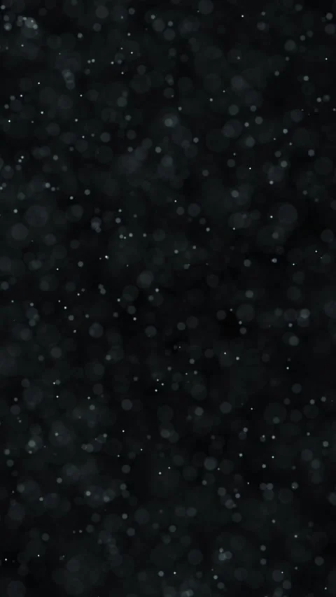 Small blurred dots slow motion loop on vertical black background Stock Footage 341607239