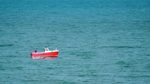 Small boat alone in ocean Stock Footage 177499010