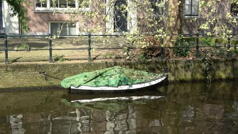 Small boat in Amsterdam Stock Footage 92759292