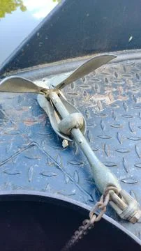 Small boat anchor Stock Photos