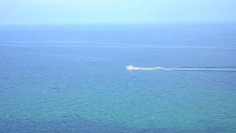 Small boat in big ocean Stock Footage 205869771