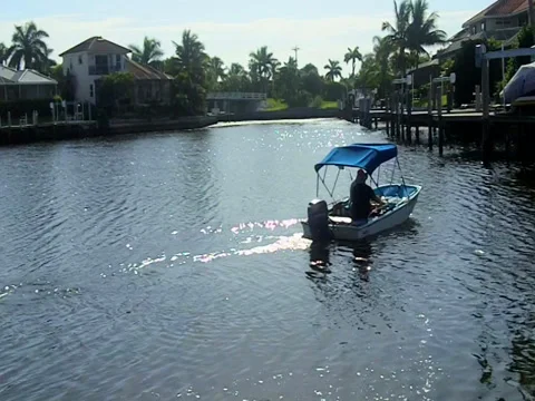 Small boat in canal Stock Footage 27750474