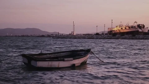 Small boat in the coast Stock Footage 114291900