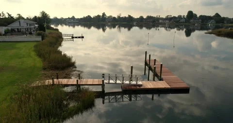 Small Boat Dock with Cloud Reflection 4K Stock Footage 172315526