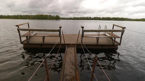 Small boat dock on a cloudy day 動画素材 107519422